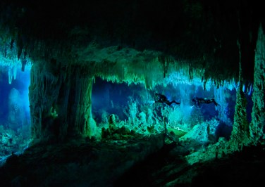 The Cascade Room, some 80 feet beneath the surface, leads divers deeper into Dan's Cave on Abaco Island. - Wes C. Skiles