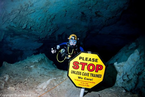 The STOP sign inside Dan's Cave. Cavern divers should not go past this sign. 