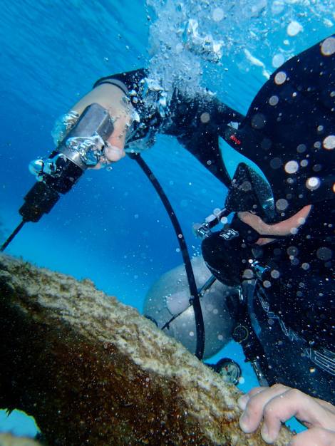 Me drilling into a reef ball